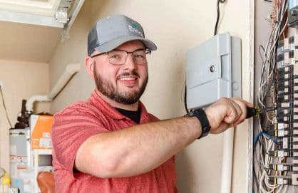 technician checking electric panels