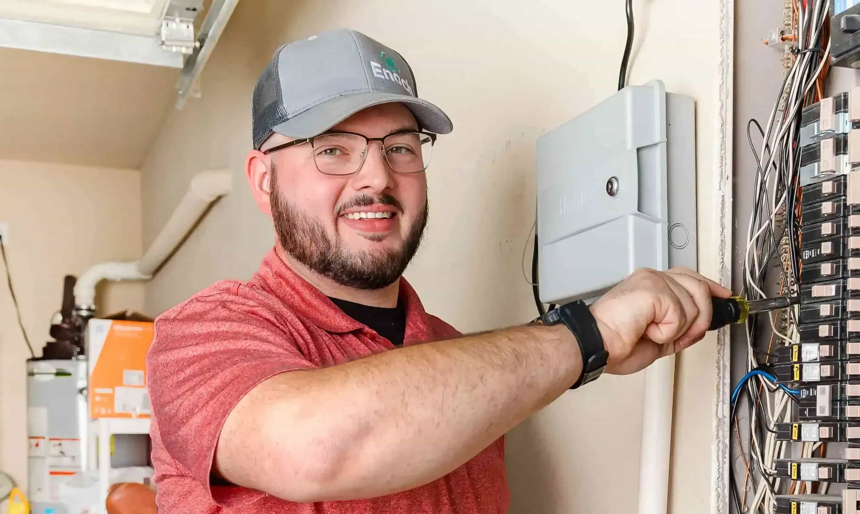 technician checking electric panel