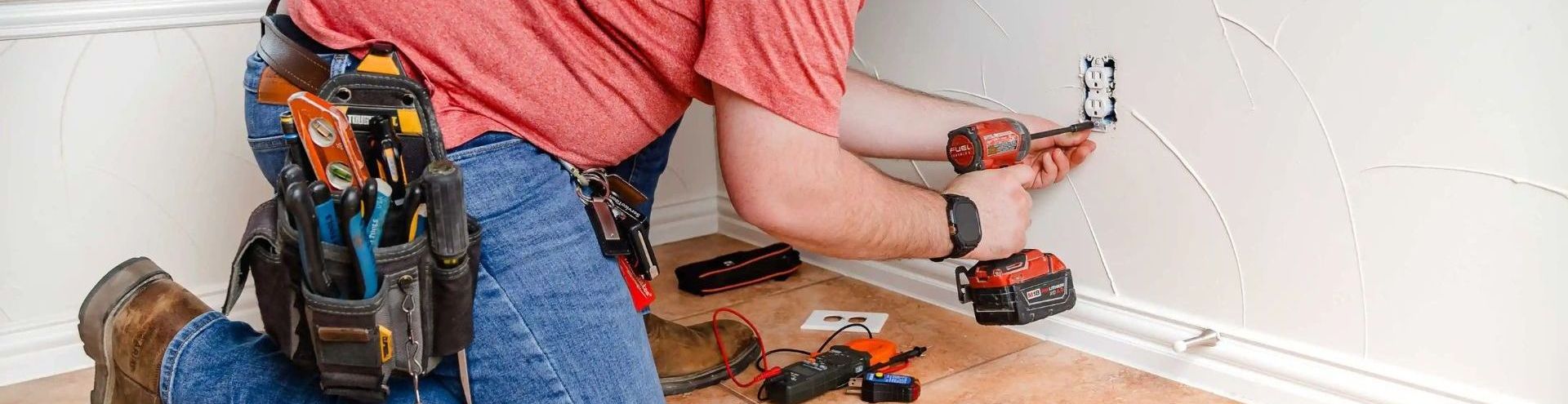 Technician installing electrical switch, demo